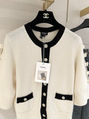 Bow-tie openwork cashmere cardigan with short sleeves