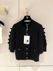 Bow-tie openwork cashmere cardigan with short sleeves