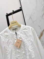 Round neck, ruffled trim, long-sleeved shirt