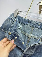 Straight-leg jeans with gold buttons