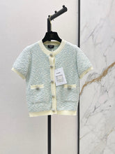 Chanel/Short-sleeved cardigan with contrasting trim