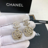 CHANEL 26S DOUBLE C LOGO PEARL HEART DROP EARRINGS WITH CRYSTAL DETAIL IN GOLD METAL 633326