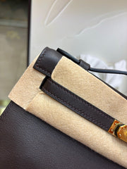 brown pochette with gold hardware