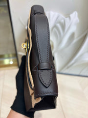 brown pochette with gold hardware