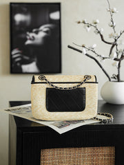 CHANEL 26S CLASSIC FLAP MEDIUM 23 IN NATURAL RAFFIA AND BLACK CALFSKIN GOLD HARDWARE