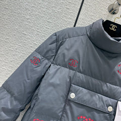 Hollowed-out, seam-sealed short down jacket