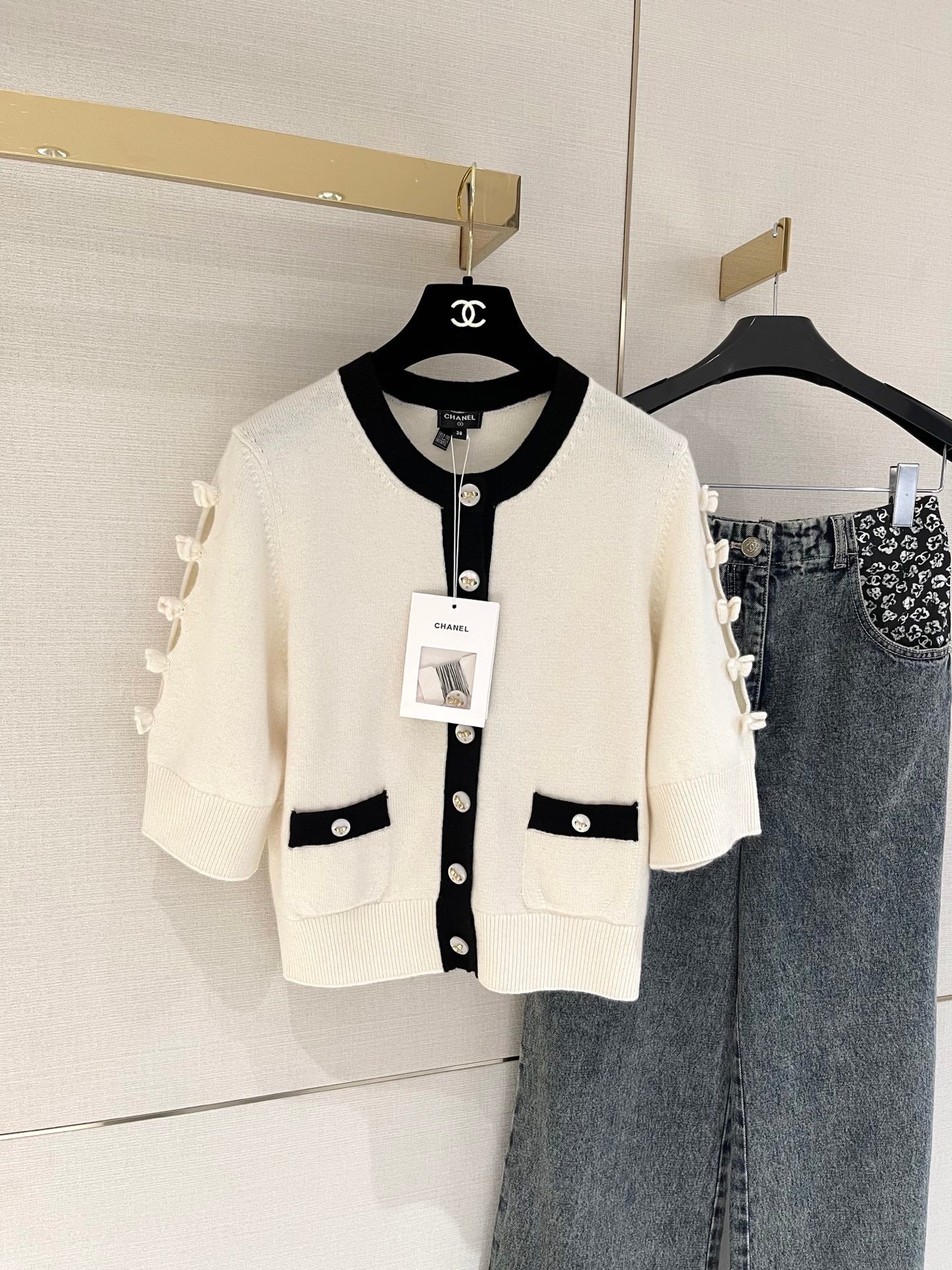 Bow-tie openwork cashmere cardigan with short sleeves