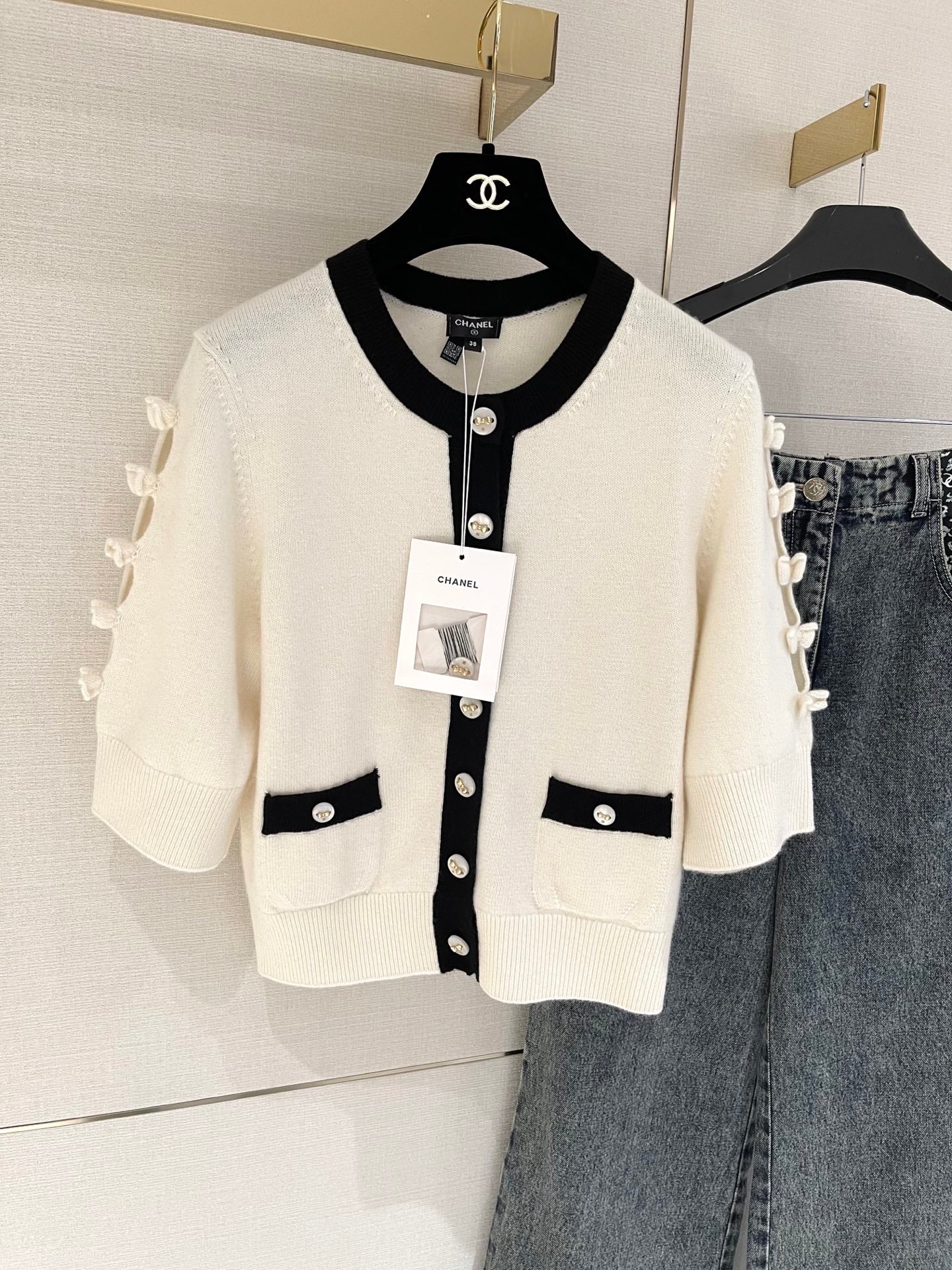 Bow-tie openwork cashmere cardigan with short sleeves
