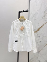 Round neck, ruffled trim, long-sleeved shirt