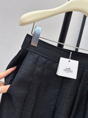 High-waisted elasticated pleated cotton trousers