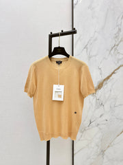 Warm-toned knit short-sleeved top