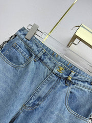 Straight-leg jeans with gold buttons