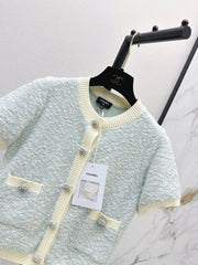Chanel/Short-sleeved cardigan with contrasting trim