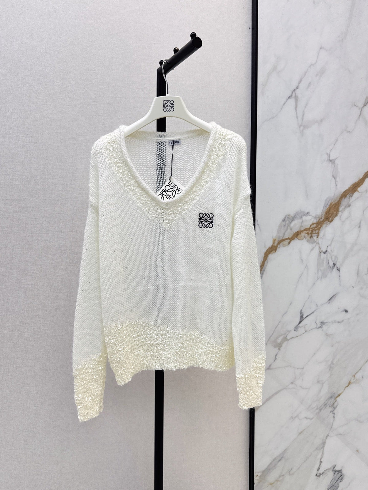 26FW Long-sleeve knit top with cut-out detail and new logo embroidery 🤍
